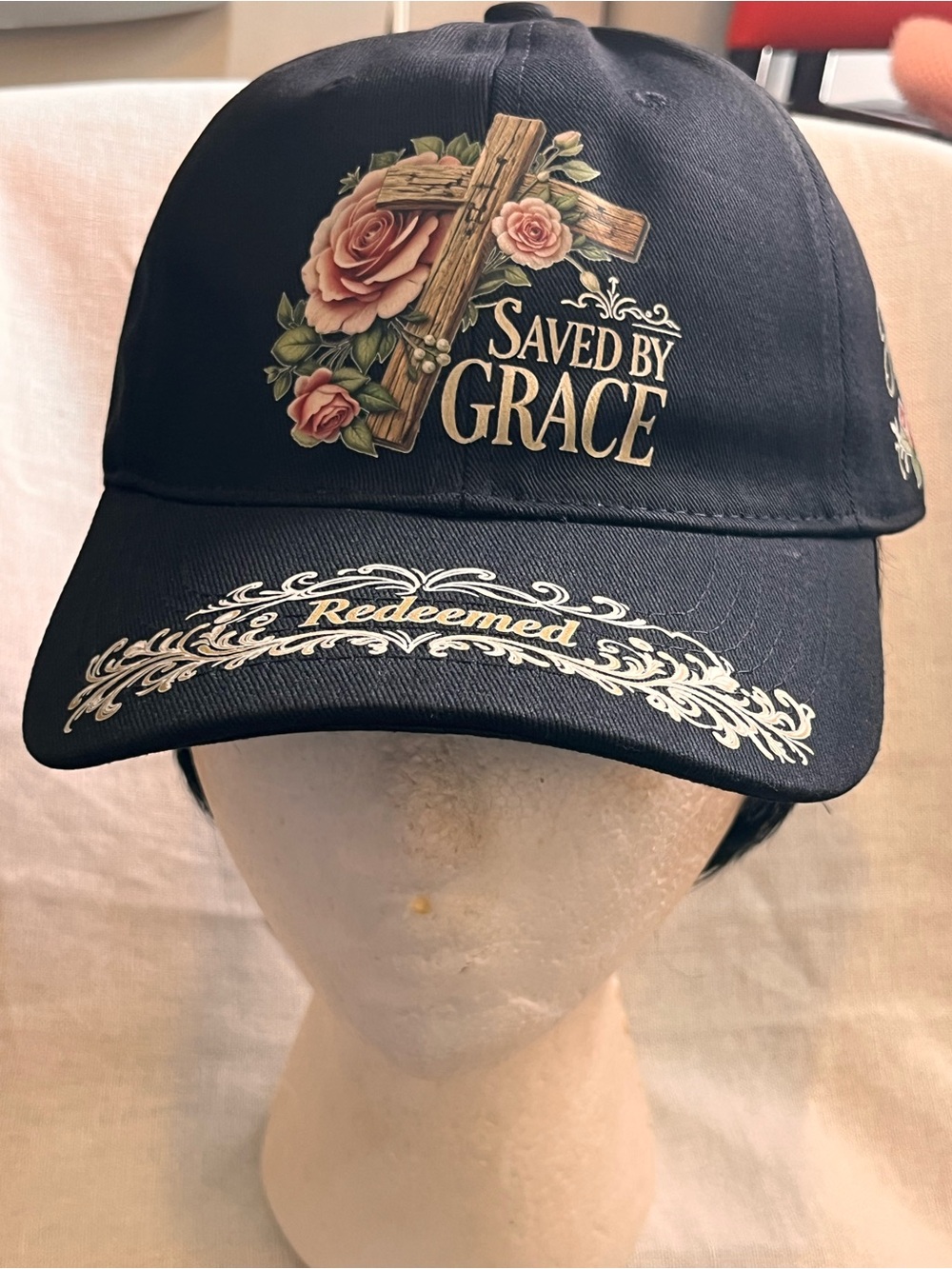 Saved by Grace Black Baseball Cap with Floral Cross